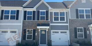 Brand New 3-Bedroom, 2.5-Bath Townhome with First-Floor Primary Suite, 1-Car Garage and 2 Driveway Parking Spaces in Rollman Farms - Available Now! Gallery 1