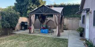 Private 2-Bedroom Rear House | Private Backyard + Patio | In-Unit Laundry. Gallery 1
