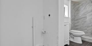Bright & Updated 2BR Bottom Unit Duplex | White Kitchen & Stainless Appliances in Saint Petersburg Gallery 13