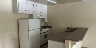 Rare Complex located conveniently behind Round Hill Square in walking distance to the Lake. Gallery 1