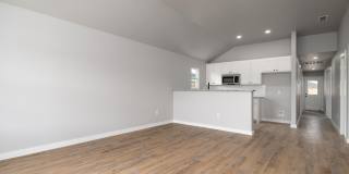 Spacious 3 Bedroom Home Located Less Than 15 Minutes from Stargate with Beautiful Modern Finishes Throughout Gallery 1