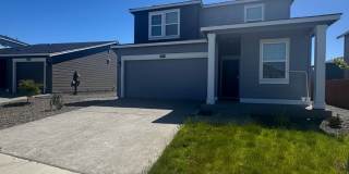 4-Bedroom Home with Low-Maintenance Landscaping Gallery 1