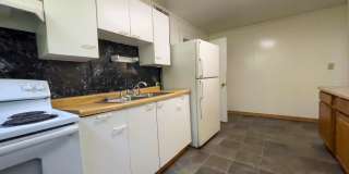 Fall into this cozy 3-Bedroom Home with a fenced in yard & detached garage! Gallery 11