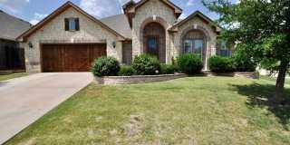FOR LEASE in ALEDO ISD! Beautiful 3,000+ sf Brick Home with 4 Bedrooms, 3 Bathrooms Plus an Office & Upstairs Flex/Loft Area in a Nice Neighborhood on A Quiet Cul-De-Sac. Gallery 1