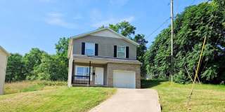 4 Bed / 2 Full Bath House with Brand-New Kitchen, Attached Garage, and Full Basement - Built 2001 Gallery 1
