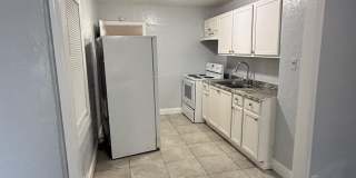 Fully Renovated 2/1 + Bonus Room Single Family Available Now! Gallery 12