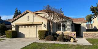 Well-appointed single-story home located walking distance to Manteca's Woodward Park! Gallery 1