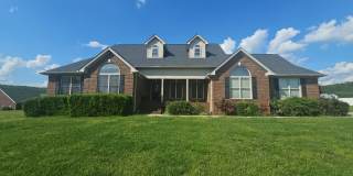 Bright 3-Bedroom Home with Sun Room, Fireplace & Two-Car Garage Gallery 1