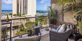 Live the ultimate Honolulu dream in this modern furnished, Hawaiian-style tiki condo! Gallery 1