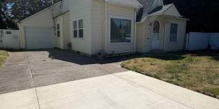 2 Bedroom with a garage with Large fenced yard! Gallery 1