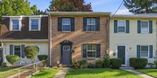 Charming 3-Bedroom Townhome with Central Air, Basement & Off-Street Parking Charming 3-Bedroom Townhome with Central Air, Basement & Off-Street Parking Gallery 1