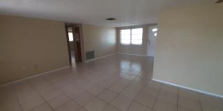 JUST REDUCED!!! 2/1.5/1 1000 Sq. Ft. NEW AC!!!Spacious living room, Lanai, fenced in yard, and tile floors thoughout! Gallery 5