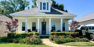 Custom built, almost brand new one story 3/2 home with all of the East Hill charm! Gallery 1