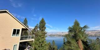 **MOVE IN SPECIAL** Reduced Price and Half off Deposit! 4 Bed, 2 Bath Home with Spectacular Lake Chelan Views! Gallery 1