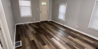 Charming 2-Bedroom Home | Fenced Backyard | Prime Lansing Location Gallery 1