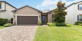 MOVE IN SPECIAL-Gorgeous Energy Efficient 4/2 Home in Gated Community Close to Lake Nona Gallery 1