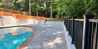 5 BR 4.5 BA home with inground heated pool and extensive hardscape! Gallery 4