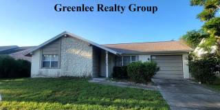 Spacious 2/2 home in Holiday—move-in ready and close to the beach! Gallery 1
