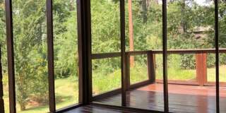 Travelers Rest !! 3 BR, 2 BA with Great Living Space - Den, Bonus Room, Primary Suite has a HUGE walk in Closet, Laundry Room, private screened in porch & deck AND a storage shed out back.  Fresh Paint and New LVP Floors Gallery 22