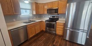 Available Now- 2 Bed/2 Bath Top Floor Condo with Covered Garage Space and Additional Storage Gallery 9