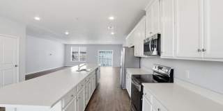 Experience refined, contemporary living in this nearly new residence designed for both comfort and style. Gallery 18