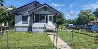 Fully fenced yard with stainless steel appliances including gas stove! Gallery 13
