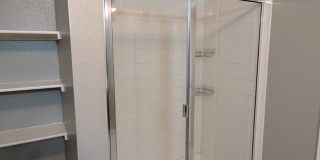 2 car garage with lighting, granite countertops. Backyard includes a custom extended concrete patio perfect for gatherings Gallery 32