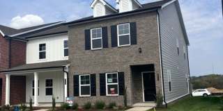 **BE THE LUCKY ONE TO LIVE IN THIS 2024-BUILT END-UNIT TOWNHOME IN A RESORT-STYLE COMMUNITY** Gallery 1