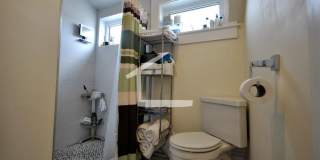 Nicely renovated Townhouse in a prime location near the Green Line with parking included! Gallery 12