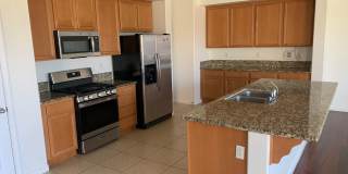 4 Bedroom Home with Paid Solar, 3-Car Garage & Large Backyard Gallery 5