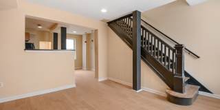 Spacious 2BR/2.5BA Townhome with Finished Basement & Extra Storage Gallery 9