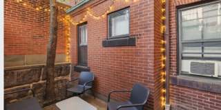 Back Bay Living with a Private Patio Oasis & Home Office Nook Gallery 1