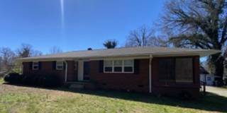 Great three bedroom home in country setting but located in town! Gallery 1