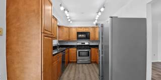 Welcome home to this light-filled, updated 4Bd/3.5Bth brick TH nestled in the sought-after Boniwood Plat! Gallery 6