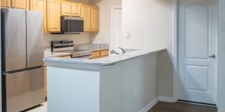 Available for Immediate Move in! Gorgeous 1 Bedroom Condo with Garage! Gallery 1