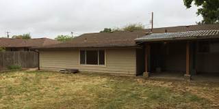 Spacious 4-Bedroom Home with Large Fenced Yard & Covered Patio Gallery 18