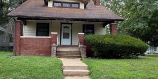 Charming West End 1.5-Story Home on a Corner Lot! Gallery 1