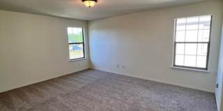 NorthPark / Taylor, TX / 4 bedrooms / Approx 2932 sq. ft. / Refrigerator / Washer & Dryer / New Carpet & Paint Gallery 21