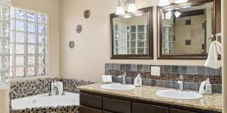 Furnished Basement home ready for move in NOW!!!  Corner lot, No HOA, lots of parking!!!  RV gates!!!  Luxurious backyard with pool and is your own Oasis in the City just out of the City!!!  Close to Lake Pleasant!!! Gallery 34