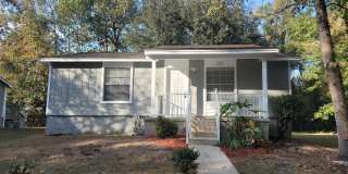 MODERN & Renovated 2/1 House w/ Big Bedrooms, Large Yard, & Deck! Stainless Steel Appliances & No Carpet! Available September 1st for $1325/Month Gallery 1
