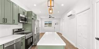 Brand new 2 bed/2 bath, central a/c, dishwasher, washer & dryer, deck & patio! April rent free! Gallery 13