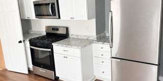 Charming 2BR Duplex in Lowell Gallery 1