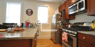 Nicely renovated Townhouse in a prime location near the Green Line with parking included! Gallery 6