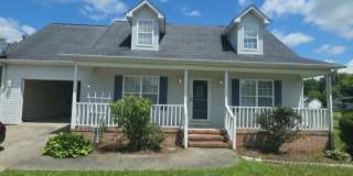 Spacious 4-Bedroom Pet-Friendly Home with Garage and Hardwood Floors Gallery 1