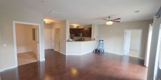 Beautiful 2nd floor (with elevator services) condominium: 2-bed, 2-bath, beautiful kitchen, bonus room, laundry room & deck! Gallery 19