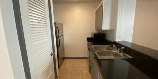 AVAILABLE:  2 BR-1 BA Hyde Park Condo / Laminate Wood Floors / Close to UT and Downtown Gallery 15