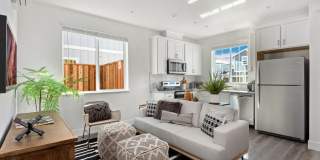Welcome Home to this 2 bed 1 bath upper unit with side back yard Gallery 1