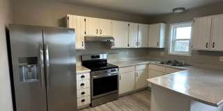 BEAUTIFULLY UPDATED 3 BEDROOM, 2 BATHROOM TWIN HOME WITH ATTACHED 1 CAR GARAGE Gallery 1