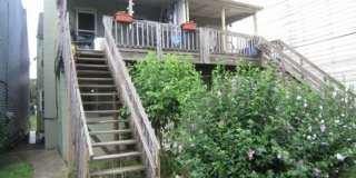 Wood floors, fresh paint, coin laundry, shared yard Gallery 1