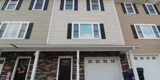 Spacious 3-Bedroom Townhome in Crescent Ridge with Garage & Private Patio Gallery 1